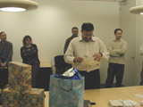 Prasad reads the card