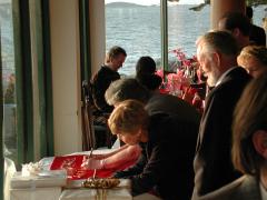 Signing the red cloth